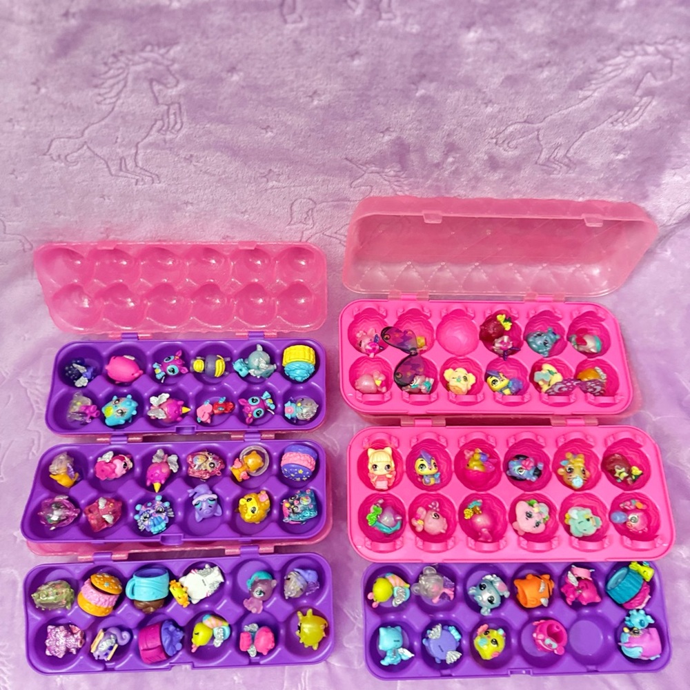Vibrant Action Figure Playset with Pink and Purple Cases